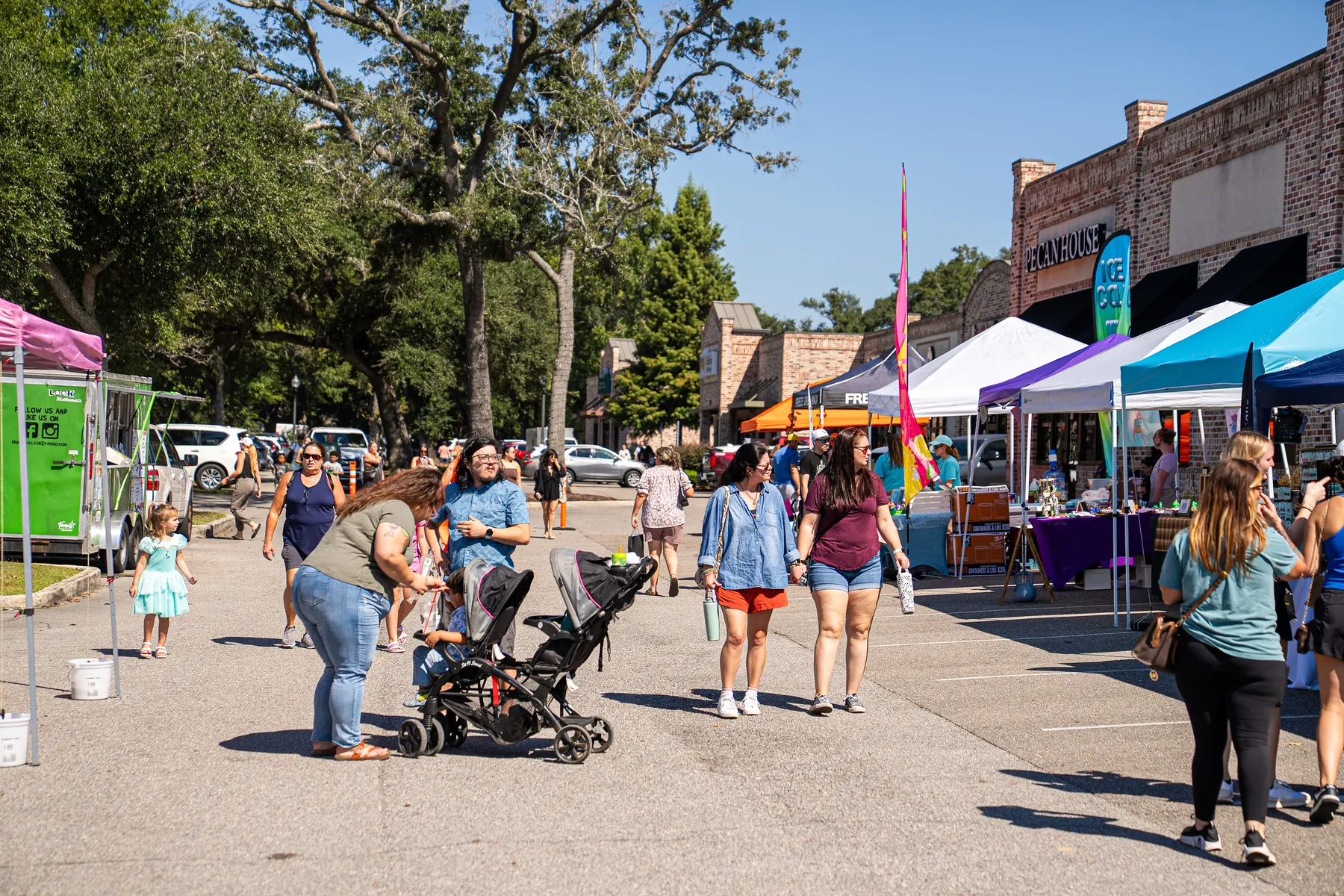 Guests walking and shopping among local vendor tents at the 2025 Fall Market