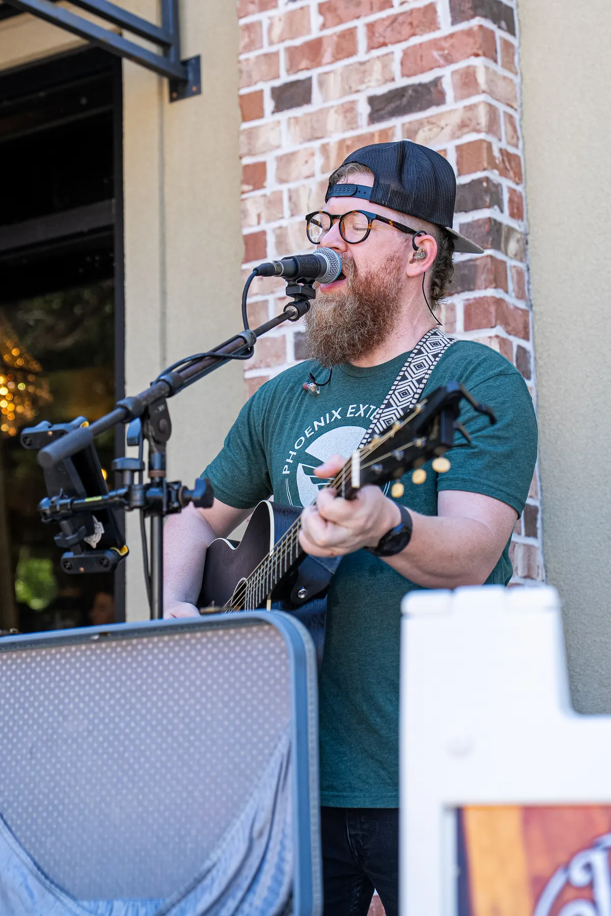 Local musician performing at a Gather Gulf Coast market